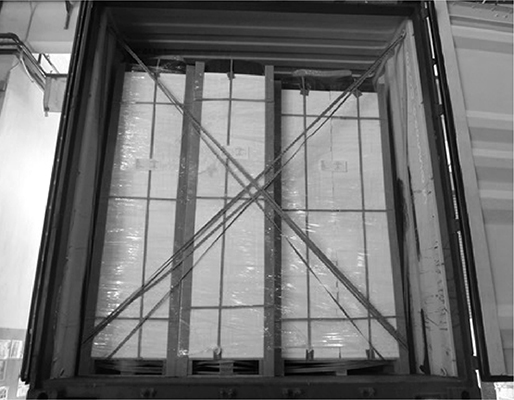 Loading stainless steel sinks into shipping containers